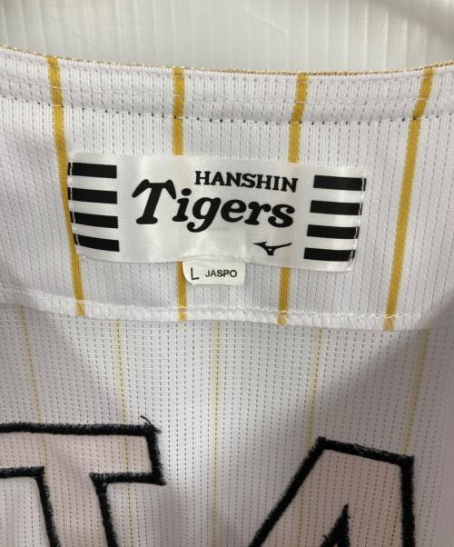 阪神タイガース（ハンシンタイガース）阪神タイガース (ハンシンタイガース) 佐藤輝明チャンピオンユニフォーム ホワイト サイズ:Lの古着・服飾アイテム