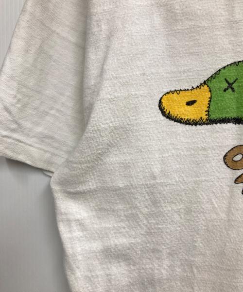HUMAN MADE（ヒューマンメイド）HUMAN MADE (ヒューマンメイド) KAWS (カウズ) ダックプリントTシャツ ホワイト サイズ:記載なし（実寸サイズを参照ください）の古着・服飾アイテム