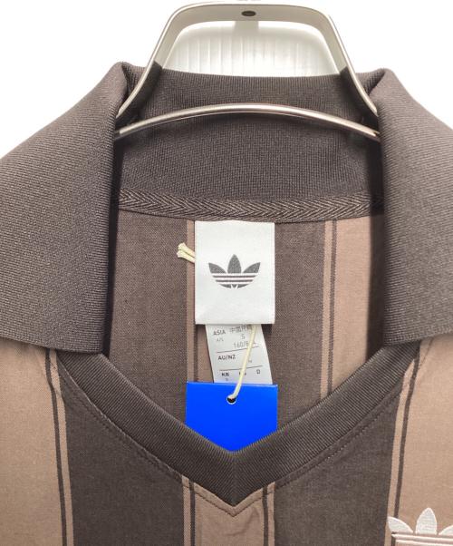 adidas（アディダス）adidas (アディダス) ショートスリーブ ACOFFE/EARTH ブラウン サイズ:Ｍ 未使用品の古着・服飾アイテム