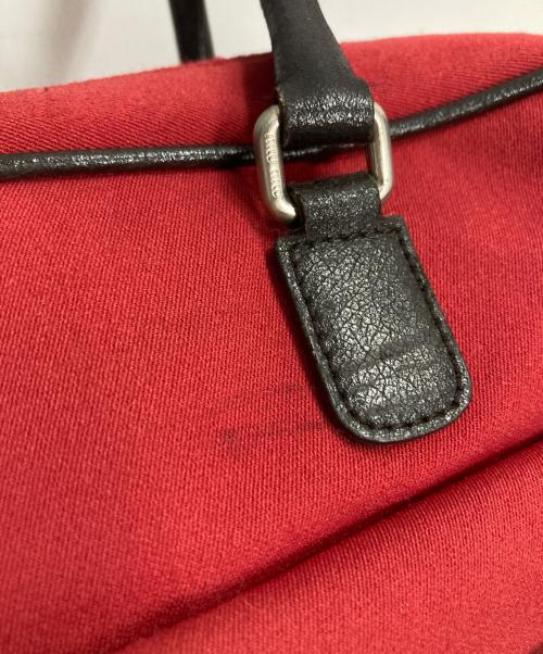 MIU MIU（ミュウミュウ）MIU MIU (ミュウミュウ) ロゴ型押しフロントリボンハンドバッグ レッドの古着・服飾アイテム