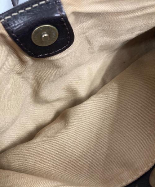 DAKOTA（ダコタ）Dakota (ダコタ) 編み込みタッセル付きバッグ ブラウンの古着・服飾アイテム
