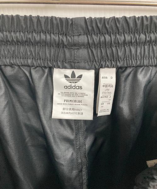adidas Originals（アディダスオリジナル）adidas originals (アディダスオリジナル) トラックカーゴパンツ ブラック サイズ:Mの古着・服飾アイテム