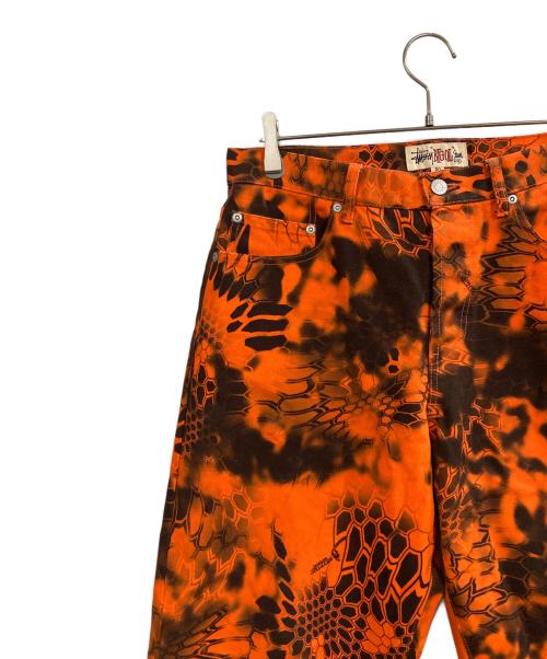 stussy（ステューシー）stussy (ステューシー) BIG OL' JEAN DENIM Kryptek Camo オレンジ サイズ:W30の古着・服飾アイテム