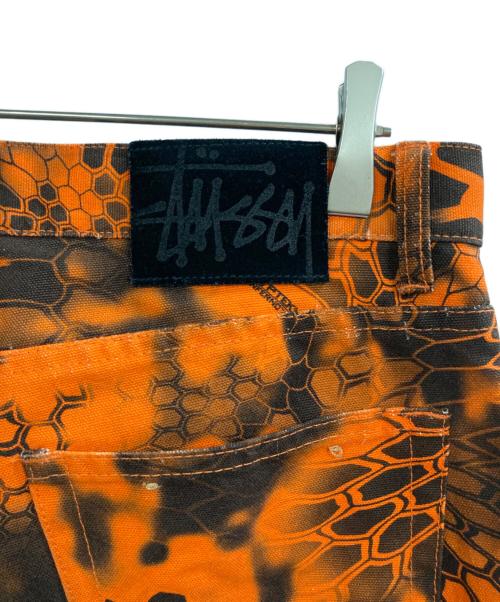 stussy（ステューシー）stussy (ステューシー) BIG OL' JEAN DENIM Kryptek Camo オレンジ サイズ:W30の古着・服飾アイテム