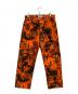 stussy（ステューシー）の古着「BIG OL' JEAN DENIM Kryptek Camo」｜オレンジ