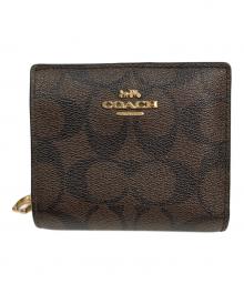 COACH（コーチ）の古着「2つ折り財布」｜ブラウン