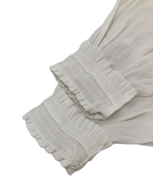 UNITED ARROWS TOKYO（ユナイテッドアローズトウキョウ）UNITED ARROWS TOKYO (ユナイテッドアローズトウキョウ) シャーリング ハイネック ブラウス ホワイト サイズ:Freeの古着・服飾アイテム