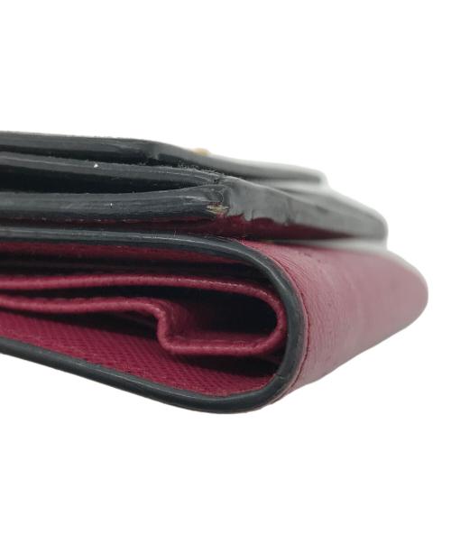 PRADA（プラダ）PRADA (プラダ) サフィアーノ 3つ折り財布 ブラック×ピンクの古着・服飾アイテム