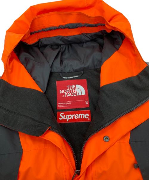 THE NORTH FACE（ザ ノース フェイス）THE NORTH FACE (ザ ノース フェイス) Supreme (シュプリーム) マウンテンライトジャケット ブラック×オレンジ サイズ:Mの古着・服飾アイテム