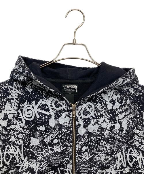 stussy（ステューシー）stussy (ステューシー) 総柄プリントジップパーカー ブラック サイズ:Lの古着・服飾アイテム
