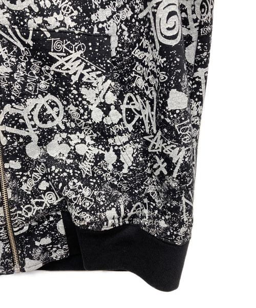 stussy（ステューシー）stussy (ステューシー) 総柄プリントジップパーカー ブラック サイズ:Lの古着・服飾アイテム