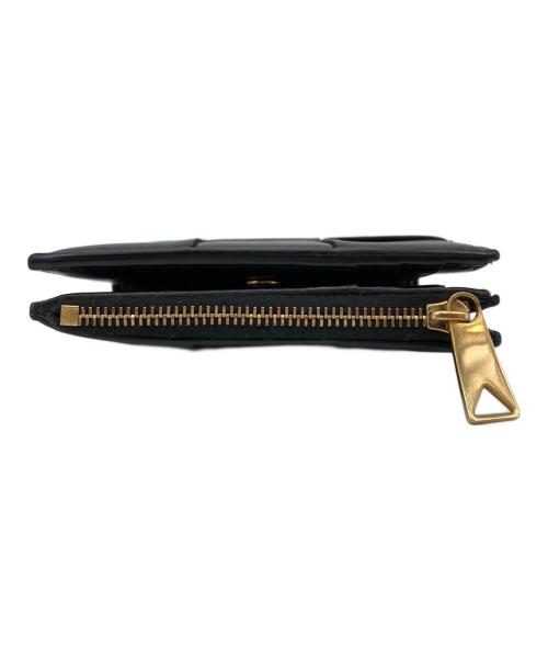 BOTTEGA VENETA（ボッテガベネタ）BOTTEGA VENETA (ボッテガベネタ) カセット スモール 二つ折りウォレット ブラックの古着・服飾アイテム