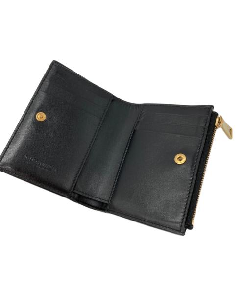 BOTTEGA VENETA（ボッテガベネタ）BOTTEGA VENETA (ボッテガベネタ) カセット スモール 二つ折りウォレット ブラックの古着・服飾アイテム
