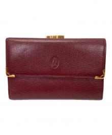 Cartier（カルティエ）の古着「マストドゥカルティエ 3つ折り財布」｜レッド