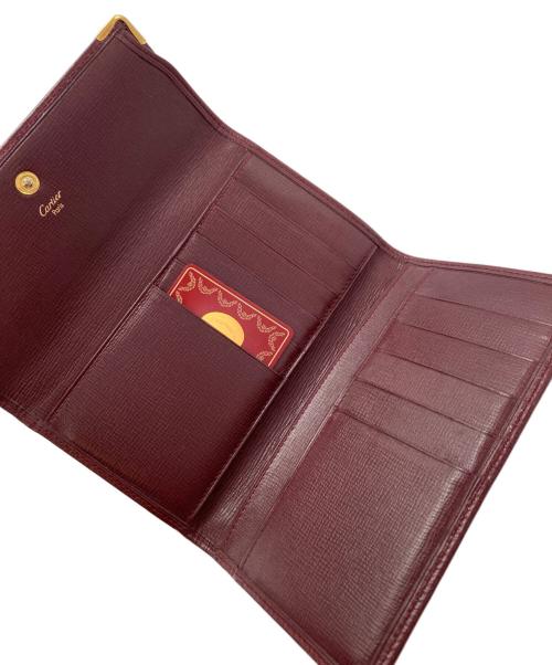 Cartier（カルティエ）Cartier (カルティエ) マストドゥカルティエ 3つ折り財布 レッドの古着・服飾アイテム