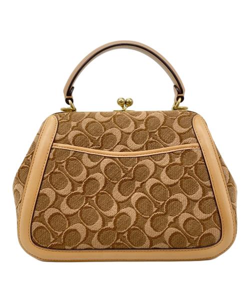 COACH（コーチ）COACH (コーチ) シグネチャージャカードハンドバッグ ブラウンの古着・服飾アイテム
