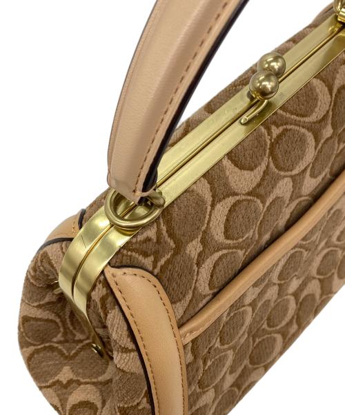 COACH（コーチ）COACH (コーチ) シグネチャージャカードハンドバッグ ブラウンの古着・服飾アイテム