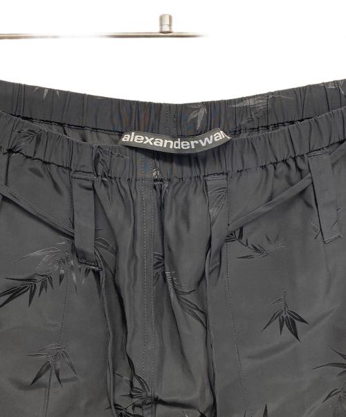 ALEXANDER WANG（アレキサンダー・ワン）ALEXANDER WANG (アレキサンダーワン) フラワーモチーフトラウザーパンツ ブラック サイズ:XSの古着・服飾アイテム