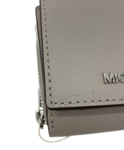 MICHAEL KORS（マイケル・コース）MICHAEL KORS (マイケルコース) 3つ折り財布 グレー 未使用品の古着・服飾アイテム
