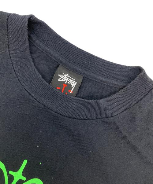 stussy（ステューシー）stussy (ステューシー) UNDEFEATED (アンディフィーテッド) コラボプリントTシャツ ブラック サイズ:Lの古着・服飾アイテム
