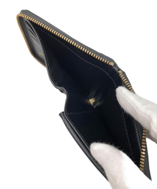 COMME des GARCONS（コムデギャルソン）COMME des GARCONS (コムデギャルソン) ラウンドジップウォレット ブラックの古着・服飾アイテム