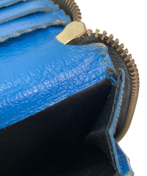 COMME des GARCONS（コムデギャルソン）COMME des GARCONS (コムデギャルソン) ラウンドジップウォレット ブラックの古着・服飾アイテム