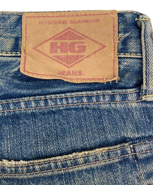 Hysteric Glamour（ヒステリックグラマー）Hysteric Glamour (ヒステリックグラマー) スタッズ HYSTERIC プリント ダメージデニム ブルー サイズ:W32の古着・服飾アイテム