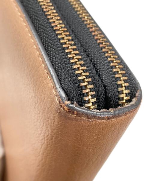 ANYA HINDMARCH（アニヤ・ハインドマーチ）ANYA HINDMARCH (アニヤ・ハインドマーチ) 長財布 ベージュの古着・服飾アイテム