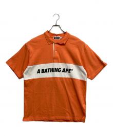 A BATHING APE（アベイシングエイプ）の古着「半袖ポロシャツ」｜オレンジ