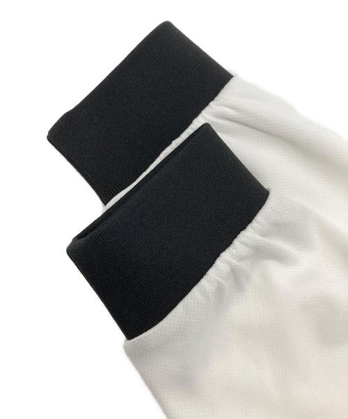 hotel palace（ホテルプレイス）HOTEL PALACE (ホテルプレイス) UMBRO (アンブロ) プリントカットソー ホワイト サイズ:Lの古着・服飾アイテム