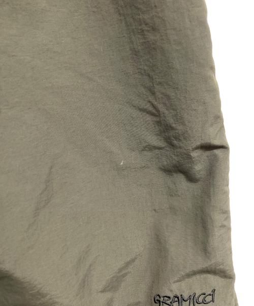 GRAMICCI（グラミチ）GRAMICCI (グラミチ) ナイロンパッカブルトラックパンツ カーキ サイズ:Mの古着・服飾アイテム