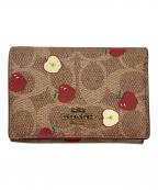 COACHコーチ）の古着「アップルシグネチャーウォレット」｜ブラウン