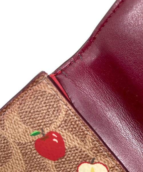 COACH（コーチ）COACH (コーチ) アップルシグネチャーウォレット ブラウンの古着・服飾アイテム