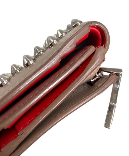 Christian Louboutin（クリスチャン・ルブタン）Christian Louboutin (クリスチャン・ルブタン) 3つ折り財布 ベージュの古着・服飾アイテム