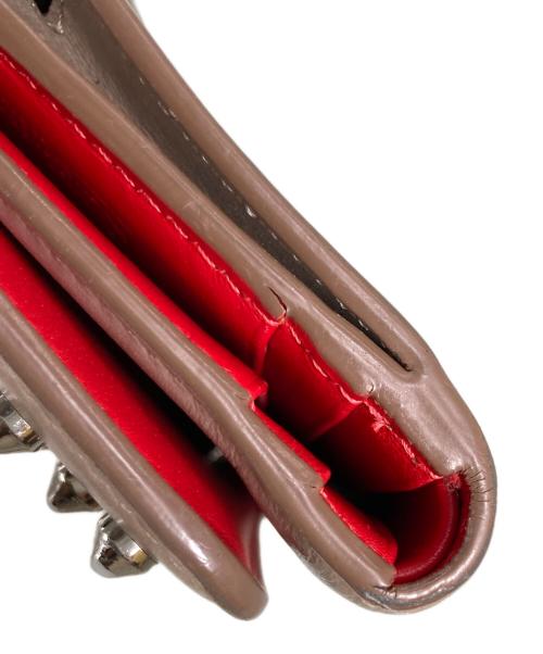 Christian Louboutin（クリスチャン・ルブタン）Christian Louboutin (クリスチャン・ルブタン) 3つ折り財布 ベージュの古着・服飾アイテム