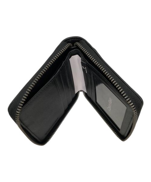 Calvin Klein（カルバンクライン）Calvin Klein (カルバンクライン) ラウンドジップウォレット ブラックの古着・服飾アイテム