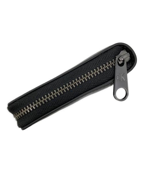 Calvin Klein（カルバンクライン）Calvin Klein (カルバンクライン) ラウンドジップウォレット ブラックの古着・服飾アイテム