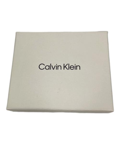 Calvin Klein（カルバンクライン）Calvin Klein (カルバンクライン) ラウンドジップウォレット ブラックの古着・服飾アイテム
