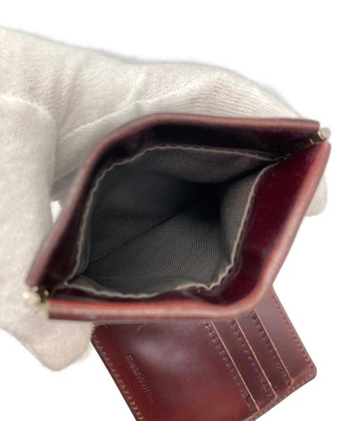 meanswhile（ミーンズワイル）meanswhile (ミーンズワイル) マネークリップ付き二つ折り財布 ブラウンの古着・服飾アイテム