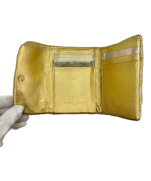tsumori chisato carry（ツモリチサトキャリー）tsumori chisato CARRY (ツモリチサトキャリー) 3つ折り財布 ゴールドの古着・服飾アイテム