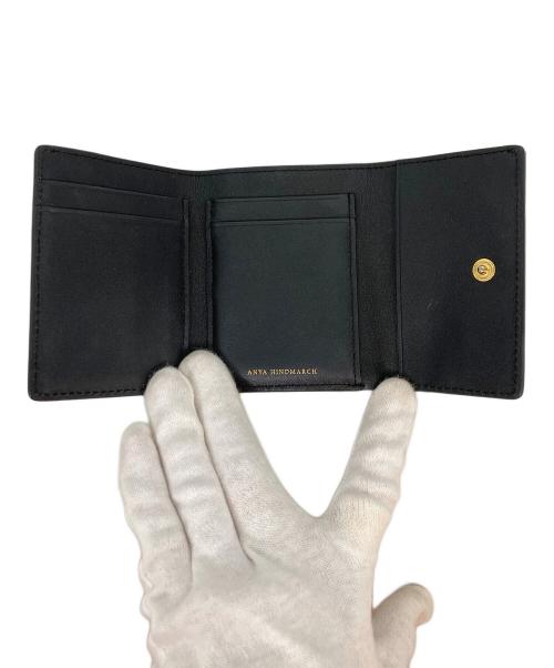 ANYA HINDMARCH（アニヤ・ハインドマーチ）ANYA HINDMARCH (アニヤ・ハインドマーチ) アイズ3つ折り財布 ブラックの古着・服飾アイテム