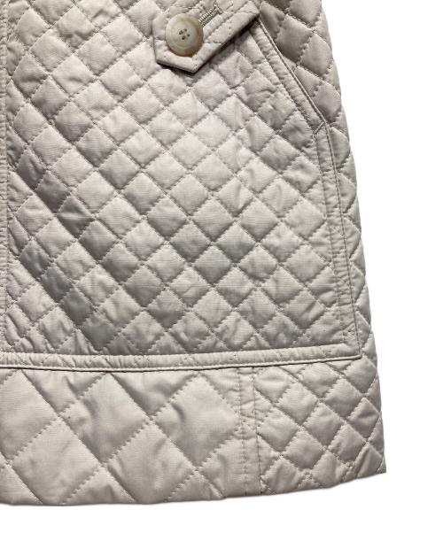 TRANS WORK（トランスワーク）TRANS WORK (トランスワーク) キルティングタフタスタンドカラーコート ホワイト サイズ:38の古着・服飾アイテム