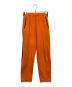 adidas（アディダス）の古着「トラックパンツ」｜オレンジ