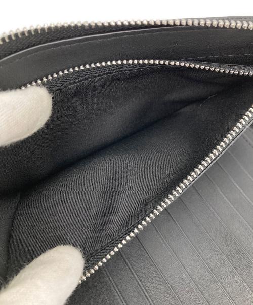 Calvin Klein（カルバンクライン）Calvin Klein (カルバンクライン) ラウンドジップウォレット ブラックの古着・服飾アイテム