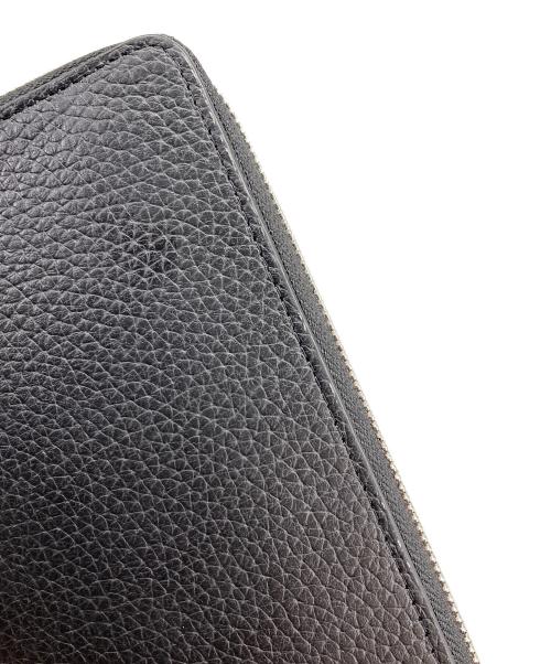 Calvin Klein（カルバンクライン）Calvin Klein (カルバンクライン) ラウンドジップウォレット ブラックの古着・服飾アイテム