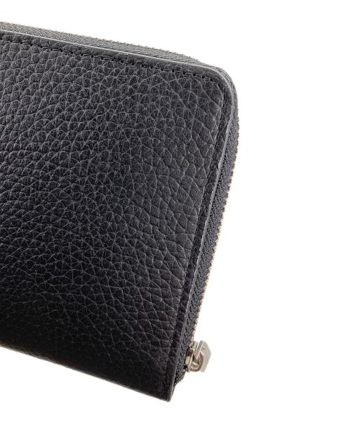 Calvin Klein（カルバンクライン）Calvin Klein (カルバンクライン) ラウンドジップウォレット ブラックの古着・服飾アイテム