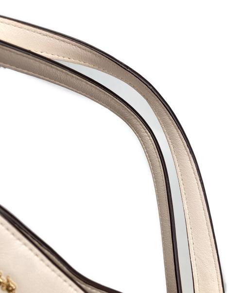 COACH（コーチ）COACH (コーチ) シグネチャー2WAYバッグ ベージュの古着・服飾アイテム