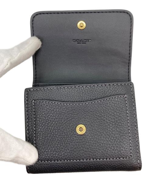 COACH（コーチ）COACH (コーチ) ミラスモールフラップウォレット ブラックの古着・服飾アイテム