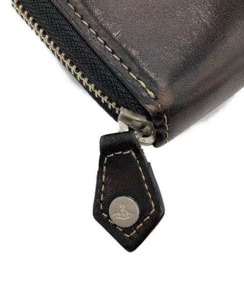 Vivienne Westwood（ヴィヴィアンウエストウッド）Vivienne Westwood (ヴィヴィアンウエストウッド) ラウンドジップウォレット ブラックの古着・服飾アイテム