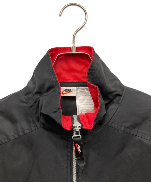 NIKE（ナイキ）NIKE (ナイキ) センタースウォッシュナイロンアノラック ブラック サイズ:Mの古着・服飾アイテム